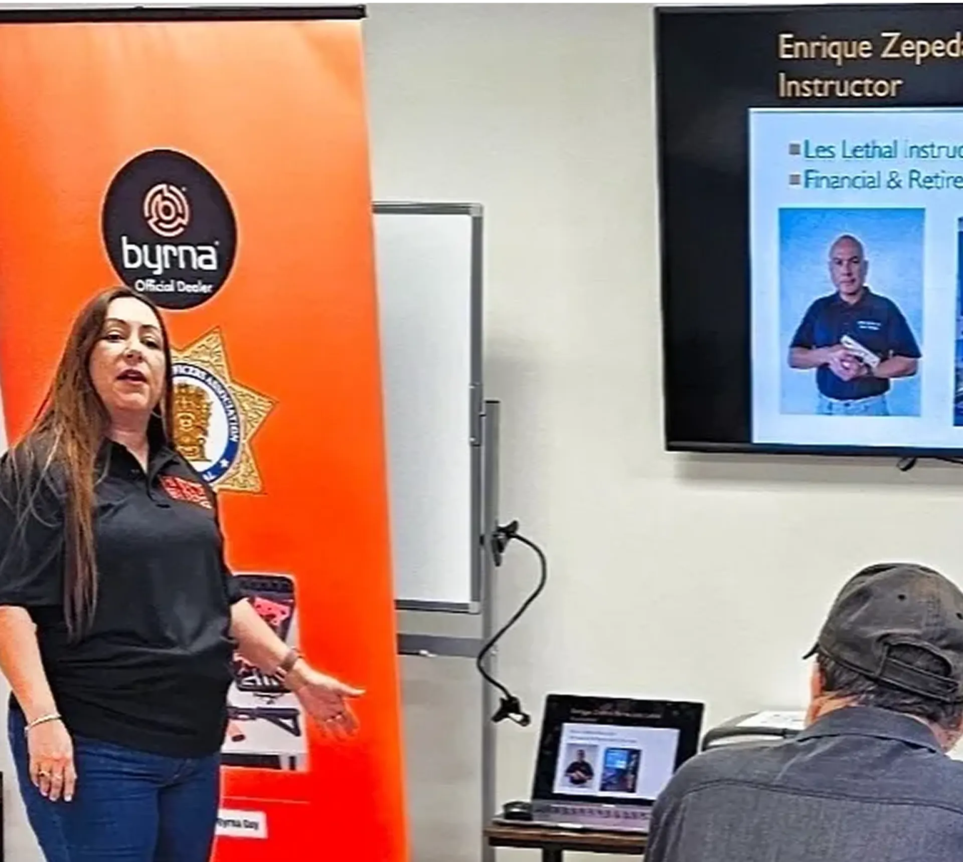 Woman presenting at a training session.