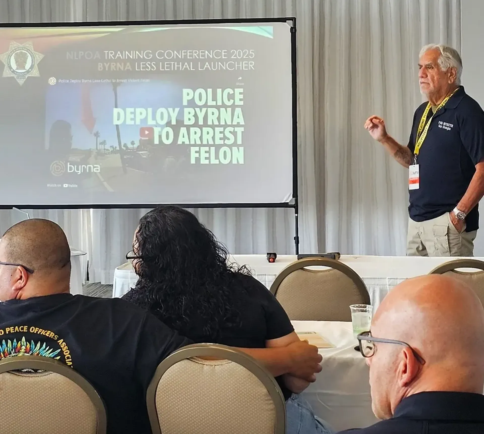 Conference presentation on Byrna less lethal launcher.